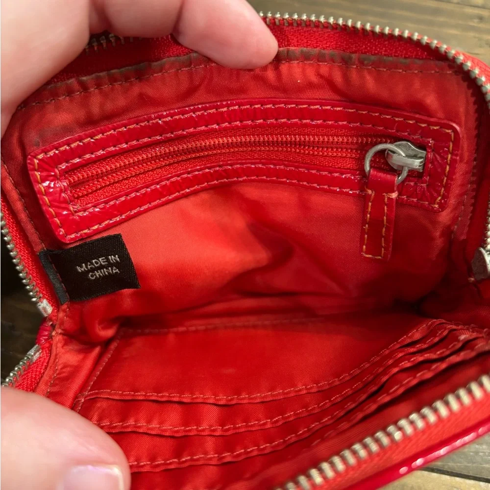 Coach Poppy Graffiti Wristlet